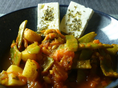 Greek-style green beans in tomato sauce with feta and rice