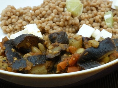 Imam bayildi with couscous and feta